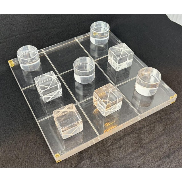 Vintage Hivo Van Teal Lucite Tic Tac Toe set, ca 1970 Signed by the artist. Board and X pieces have engraved lines. Board...