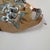 This striking ceramic piece is an original "Southern Gothic Folk Pottery" mask titled "Ghost of Liberty's Past",...