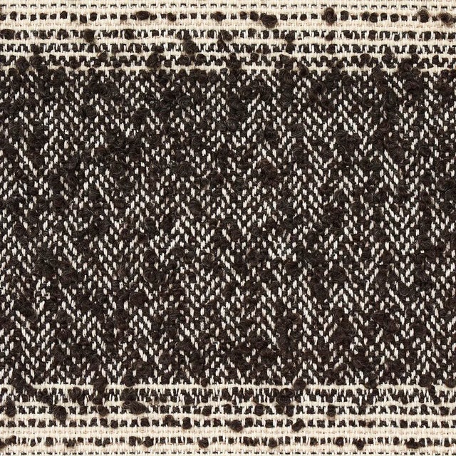 Made of cotton, wool and Peruvian alpaca and woven in the U.S. on a traditional loom, this unique fabric in brown has an...
