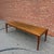 Designed by Johannes Andersen, this Danish modern coffee table pairs clean, sculpted lines with thoughtful functionality....