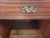 A very nice pair of Drexel Composite nightstands in Pecan Wood. These look almost new and are quite well made. Brass...