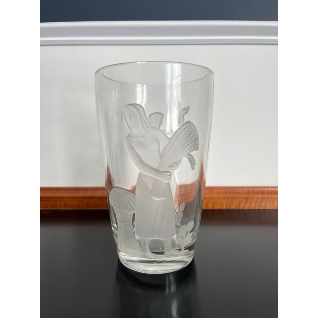 Crafted in the 1940s, this French Verlys raised glass vase epitomizes the elegance of Art Deco design. Signed by the...