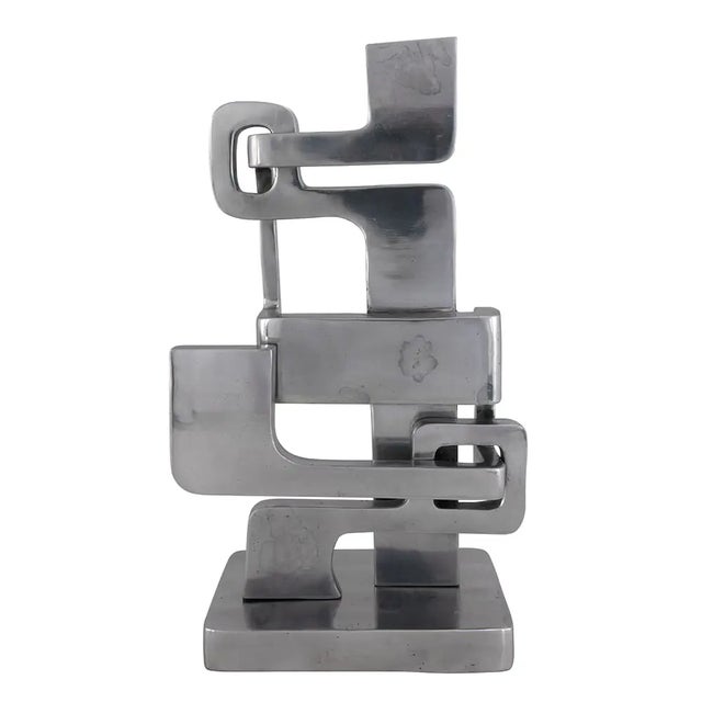 Whether displayed on a mantel, console table, or bookshelf, the Kubric Sculpture elevates the ambiance of any room with...