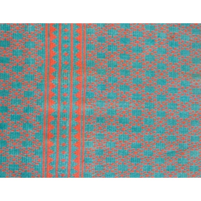 An early 20th century Persian Savek Kilim rug, woven with naturally dyed cotton, with a beautiful all-over field of small-...