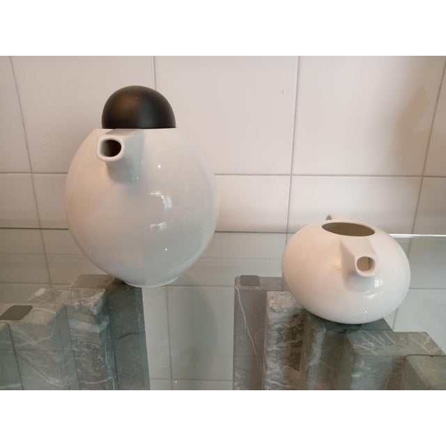 Porcelain coffee pot and milk jug, designed by the designer in neo-deco style and produced in the 80s. This piece has an...