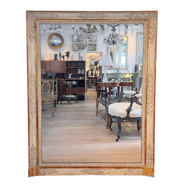 This beautiful pair of mirrors are made of giltwood and gesso with original mercury glass and original panelled backs....