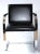 Design classic. Flaches frame made of chrome -plated steel, with black leather padding. 1990s; good condition. Design...