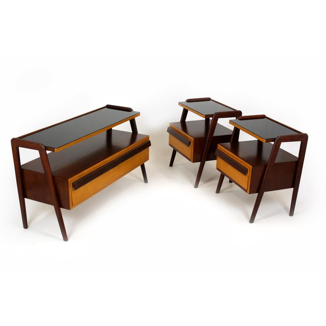 This is a restored set of Czechoslovakian bedroom furniture produced by Jitona in the 1960s, comprising a pair of...