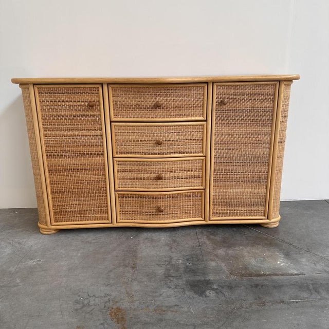 • Width: 131 cm (51.6") • Depth: 41 cm (16.1") • Height: 77 cm (30.3") An elegant vintage sideboard from the 1980s,...