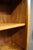 Ethan Allen cherry wood bookcase featuring a simple, rectangular design with four fixed shelves and an open front. The...