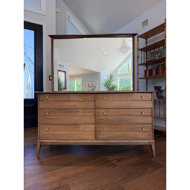 An exceptional and increasingly scarce four-piece bedroom suite from Heywood-Wakefield's coveted Cadence collection,...