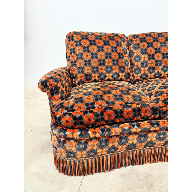 An exceptional piece in incredible condition. We offer this superb sofa with premium finishes, featuring finely cut velvet...