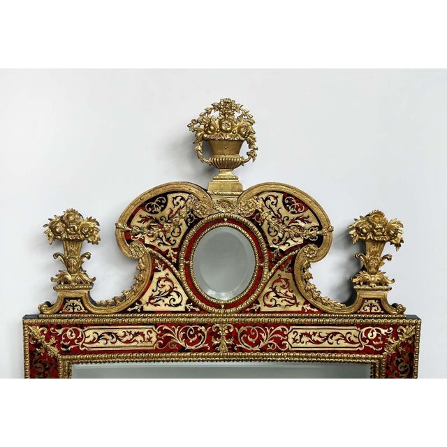 Elegant 19th century Swedish gilt-lead mounted verre églomisé mirror, in the taste of Burchardt Precht. The rectangular...
