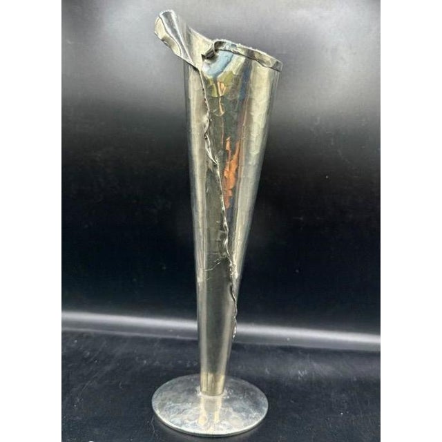 The Signed Jean Goardère France Handmade 95% Pewter Calla Lily Vase is more than a vase- it is quiet strength shaped into...