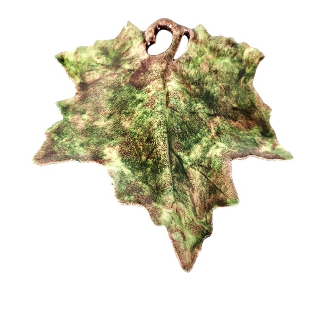 This vintage ceramic leaf wall hanging or wall pocket décor has a unique design in shades of Autumn. The texture of the...