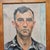an oil on canvas portrait painting of a handsome man Smoking. Framed. Unsigned