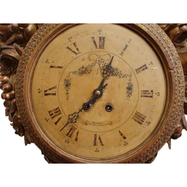 French 18th Century French Louis XVI Carved Giltwood Wall Clock With Oval Painting For Sale - Image 3 of 9
