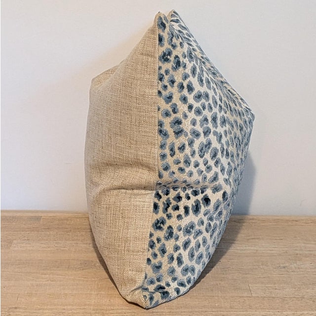 Cowtan & Tout Ocelot Azure Blue cut velvet pillow with coordinating cream linen back. Invisible zipper and professionally...