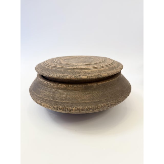 A curated set of late 19th to early 20th century primitive wooden objects, likely originating from Hungary or the broader...