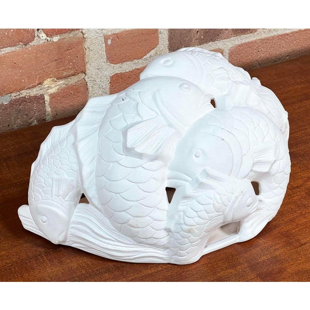 Beautiful vintage c.1990 white plaster wall sconce with dancing koi fish, made in Los Angeles California! Just a beautiful...