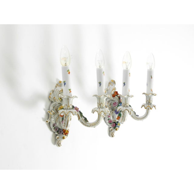 Two beautiful hand-painted mid-century modern porcelain wall lamps. made by the saxon porcelain manufactory...