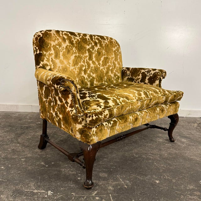 This Antique settee is a high quality piece of furniture. The piece features a carved and sculpted mahogany base and a...