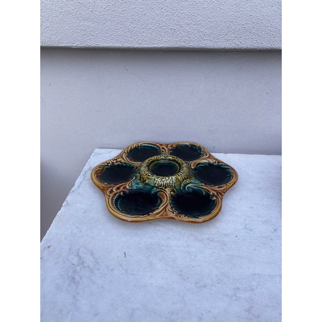 French Majolica oyster plate with yellow acanthus leaves, circa 1900.