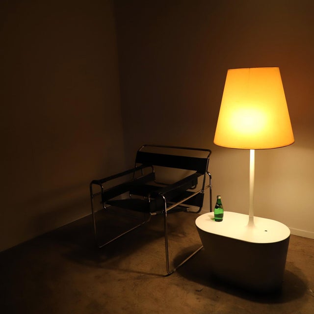 Circa 1970. We offer this Table Floor Lamp made in fiberglass. With dimmer. The original shade have some scratches....