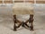 An English William and Mary style stool from circa 1900 with turned legs, curving X-Form stretcher, bun feet and...