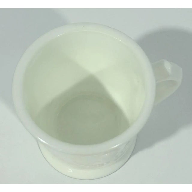 Milk glass mug by Atterbury with two profile cameos entitled, "Ceres & Cameo" (alternate name: Medallion).