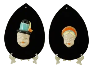 Art Deco Ceramic Masks attributed to Komlòs Brothers Manufacture, Budapest, Hungary, 1930s, Set of 2