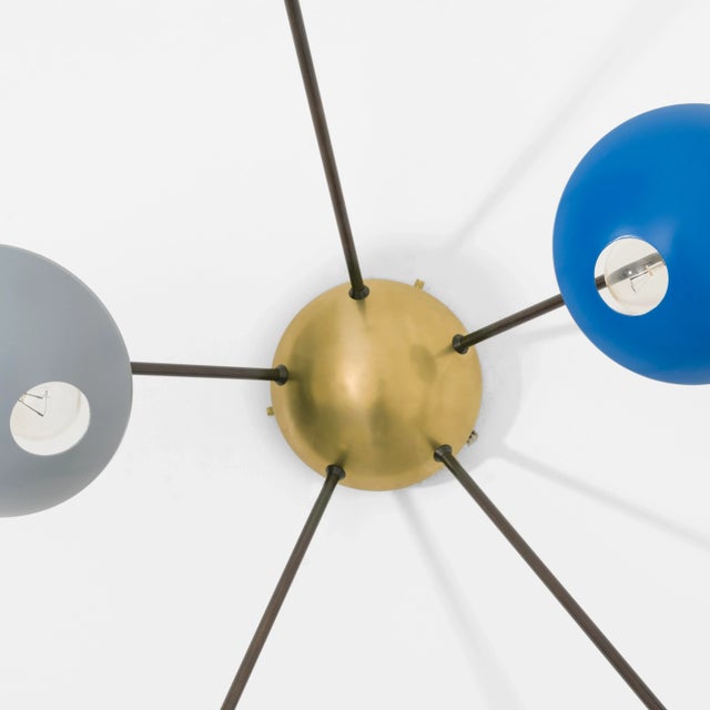 The Helios Quinque I Ceiling Light brings elegance to midcentury design through the inspiration of Italian design -...