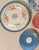 Early 20th Century Limoges Blue, Gold, and Pink Roses Desert Plate and Saucer Wall Plate Curation- Set of 6 For Sale In Palm Springs - Image 6 of 10