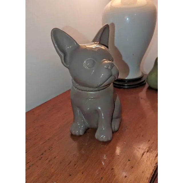 Threshold ceramics, the French Bulldog. This shiny new looking taupe cookie jar follows the trend of popular breeds.