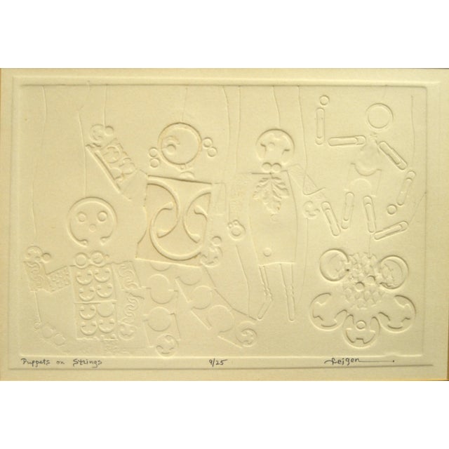 Signed by Artist Feigen, superb multi-dimensional Wall Art, mixed media Paper Stamp of Puppets on Strings. Framed in a...