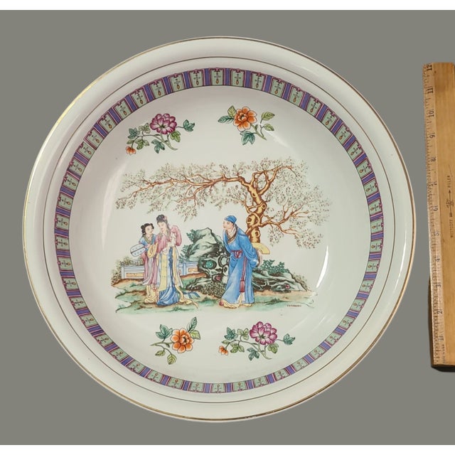 Experience the elegance of Chinese artistry with this Vintage Chinoiserie Famille Rose hand-painted figural large serving...