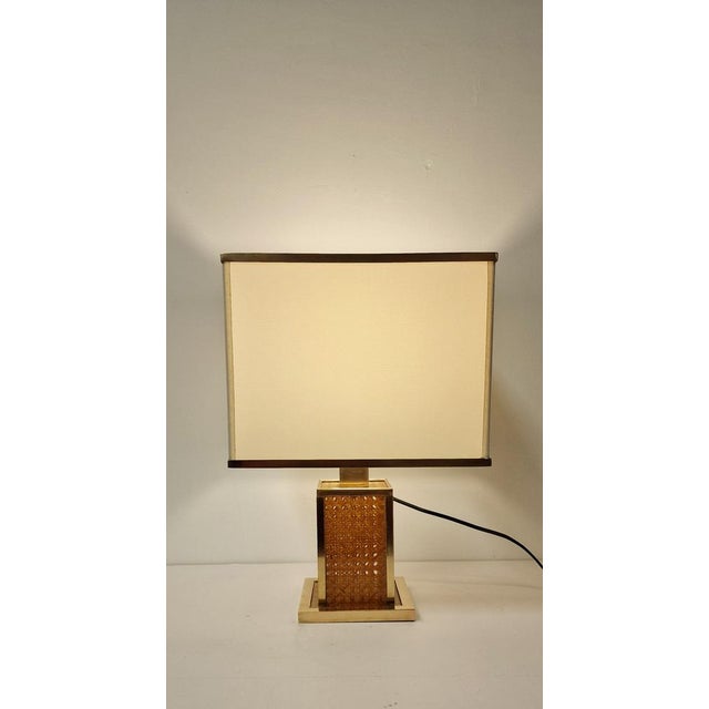 Splendid table lamp from the 70s, in perfect working order, the measurements of the lamp without lampshade are: height...