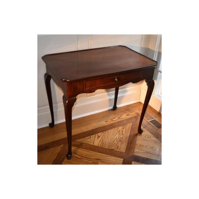 A most delicate and well scaled mahogany Dutch silver or tea table, of the 18th century. A tray formed top with lambstone...