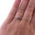 Engagement ring. The ring features an approximately 0.4 carat brilliant cut diamond, white in color, with very slightly...
