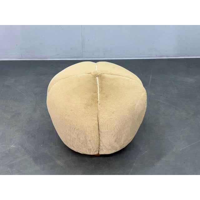 Refined Art Deco stool produced in Czechoslovakia in the 1940s. This sculptural round ottoman features a solid beech wood...