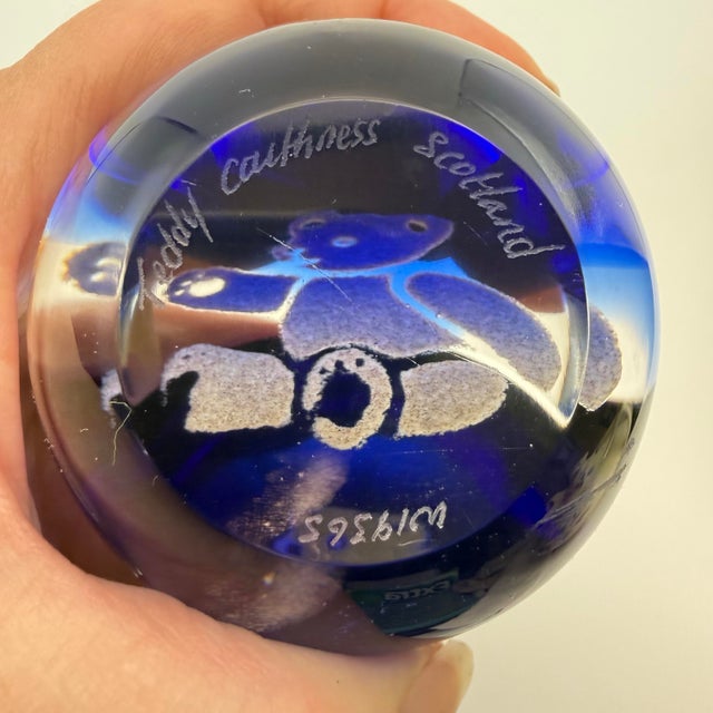 Charming, authentic art glass paperweight from the renowned Caithness Glass in Scotland. It features a beautifully...