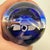 Charming, authentic art glass paperweight from the renowned Caithness Glass in Scotland. It features a beautifully...