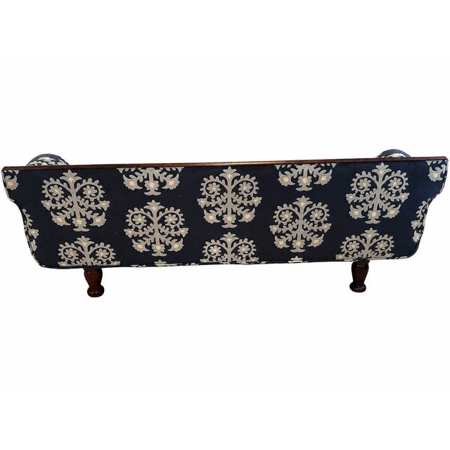American Empire sofa, likely dating to the 1830s. Mahogony trim over solid hardwood construction. Newly reupholstered with...