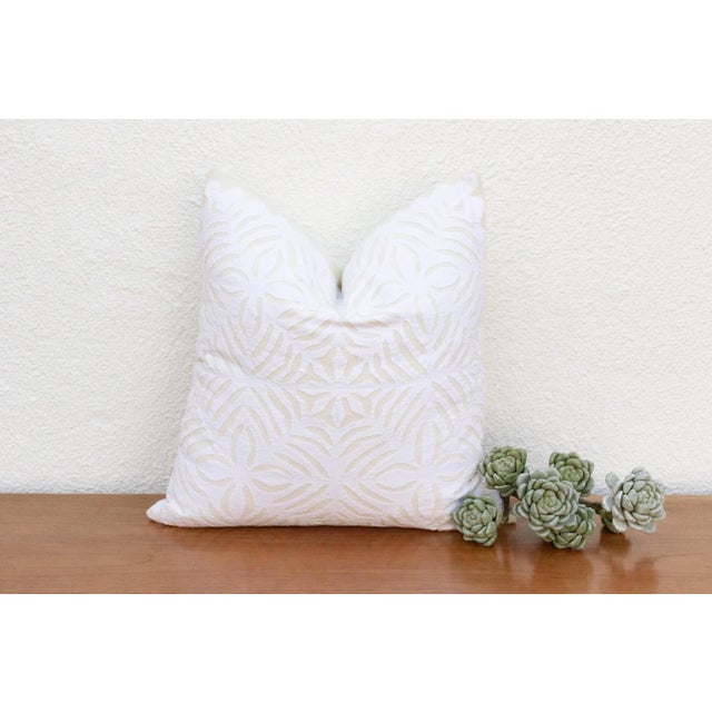 This decorative pillow cover features beautiful array of patterns, with hand crafted appliqué cut work, giving it a...