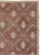 This mid-20th-century Turkish Anatolian throw rug presents an elegant allover composition across a muted dusty-rose field....