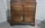 A very nice two piece Georgian oak court cupboard with panelled sides and doors, two drawers and four doors, standing on...