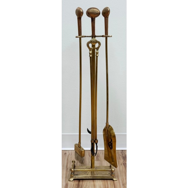 Utility and style! Vintage Hollywood Regency style solid brass fireplace tool set with clamshell motif handles. Set...