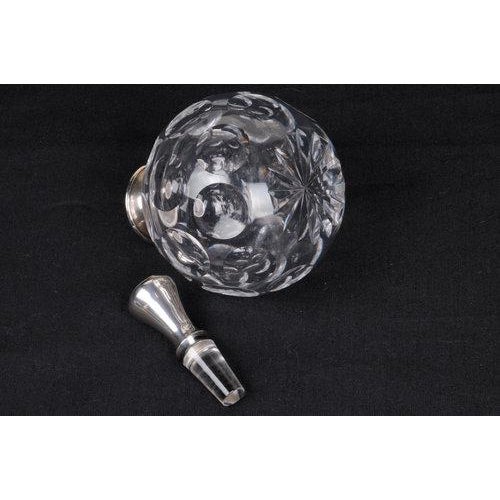 Hawkes Crystal & Sterling Perfume Bottle. Bulbous form with cut thumbprint design, Marked "Hawkes". Top of the bottle is...