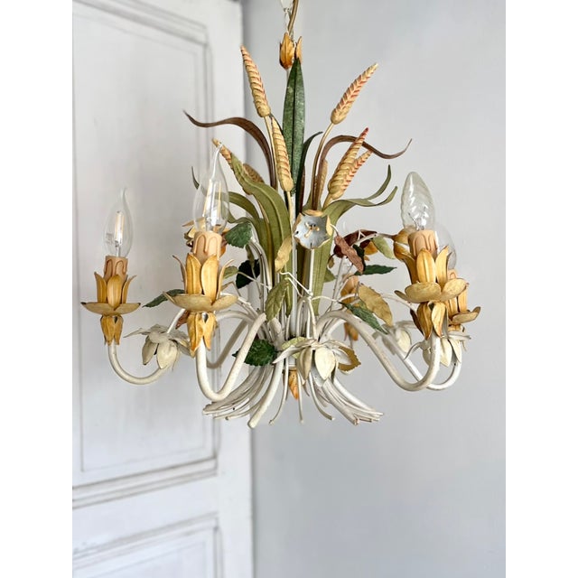 French six-light chandelier manufactured by Sofidis FlorArt. Constructed in hand-painted tole, the chandelier features a...