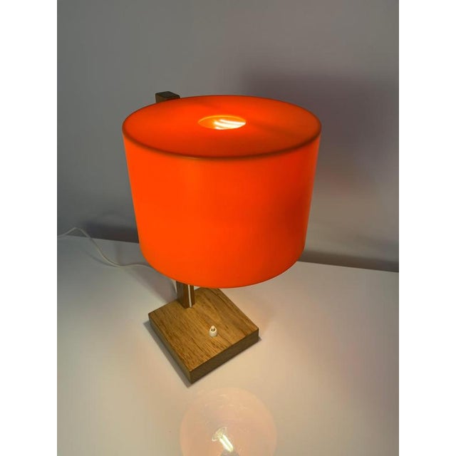 This desk lamp from Luxus Vittsjö is a Swedish design classic that impresses with its minimalist form and exciting mix of...